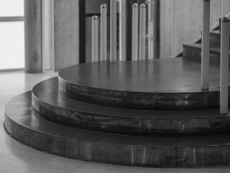 A black and white photo of a set of stairs